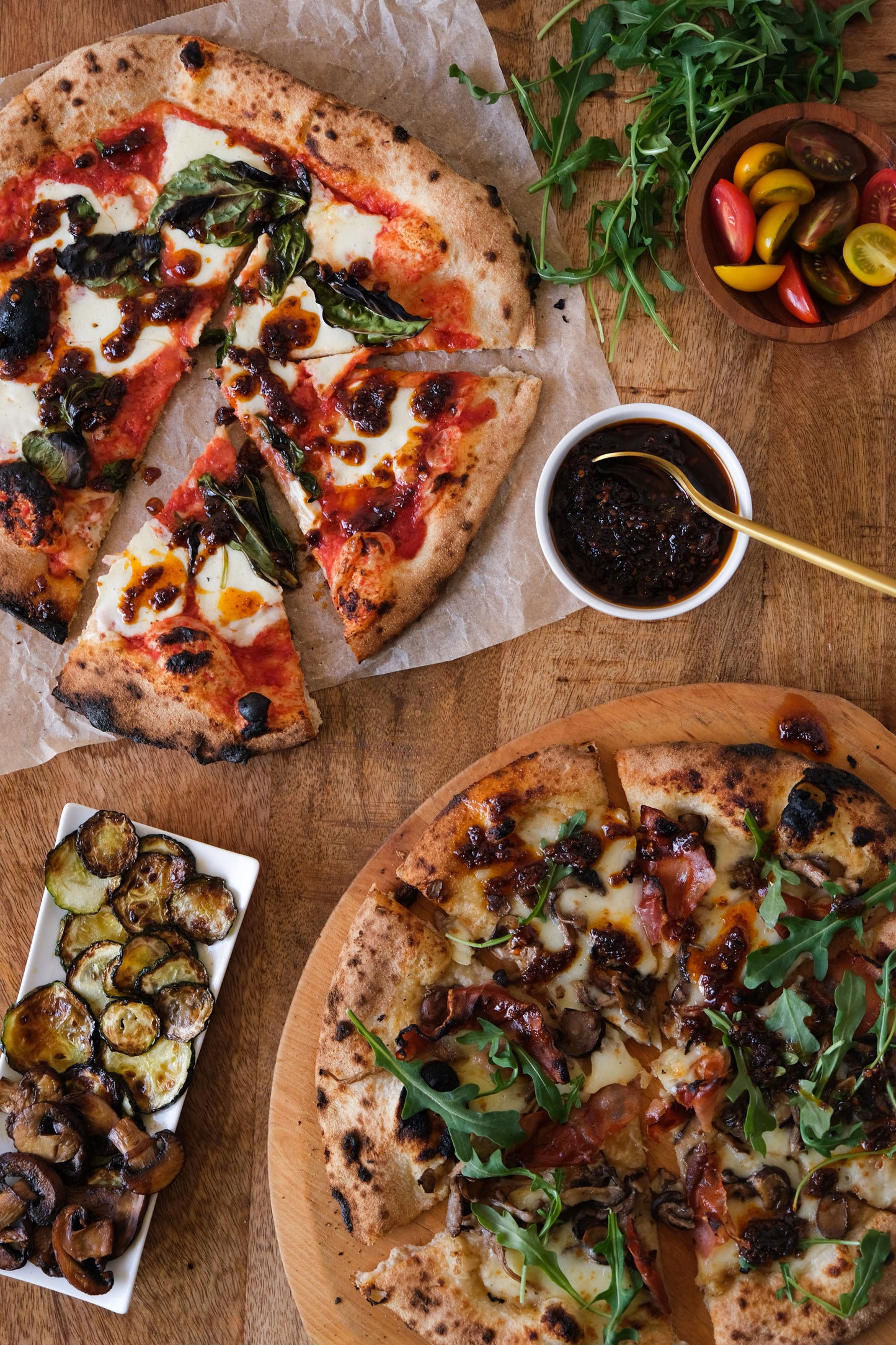 Mushroom, vegetable pizza with vegan chili oil condiment 